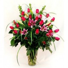 A Nice Presentation Of Star Gazer Lilies With Roses